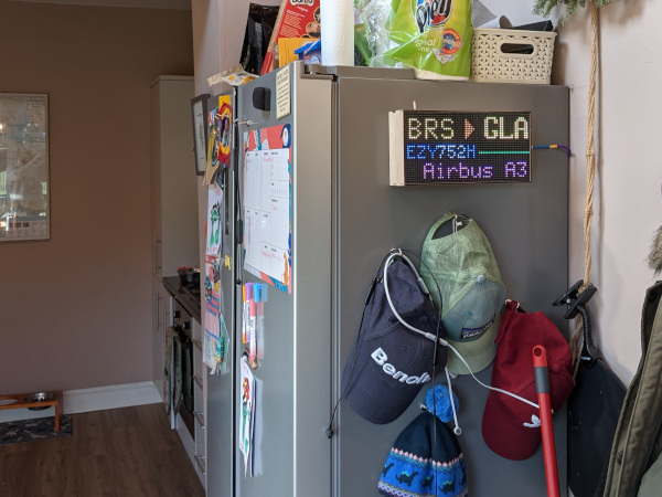 Flight tracker sitting on the fridge