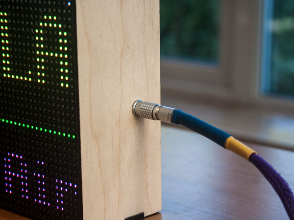 Close up of Lemo connector on the cable mating with a Lemo panel connector